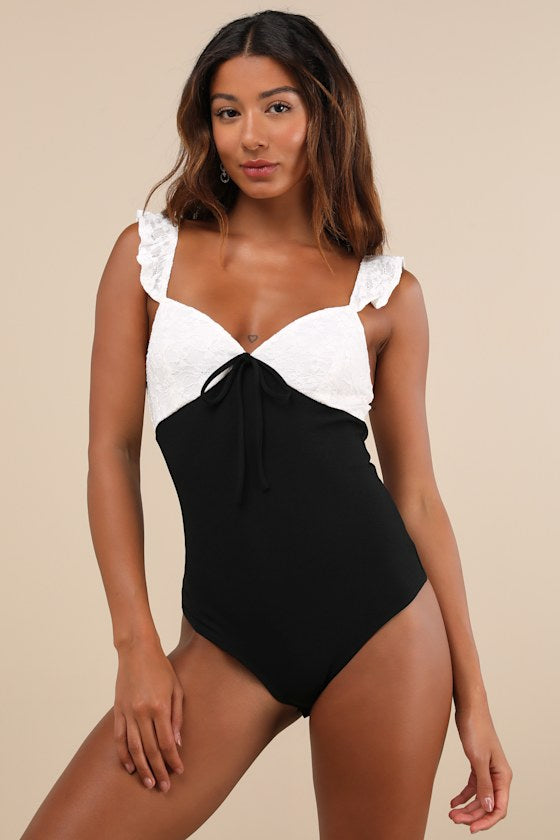 Marvelous Sweetie Ivory and Black Lace Ruffled Bow Bodysuit