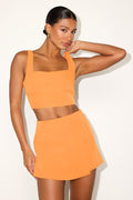 Exceptionally Styled Orange Lace-Up Two-Piece Skort Romper