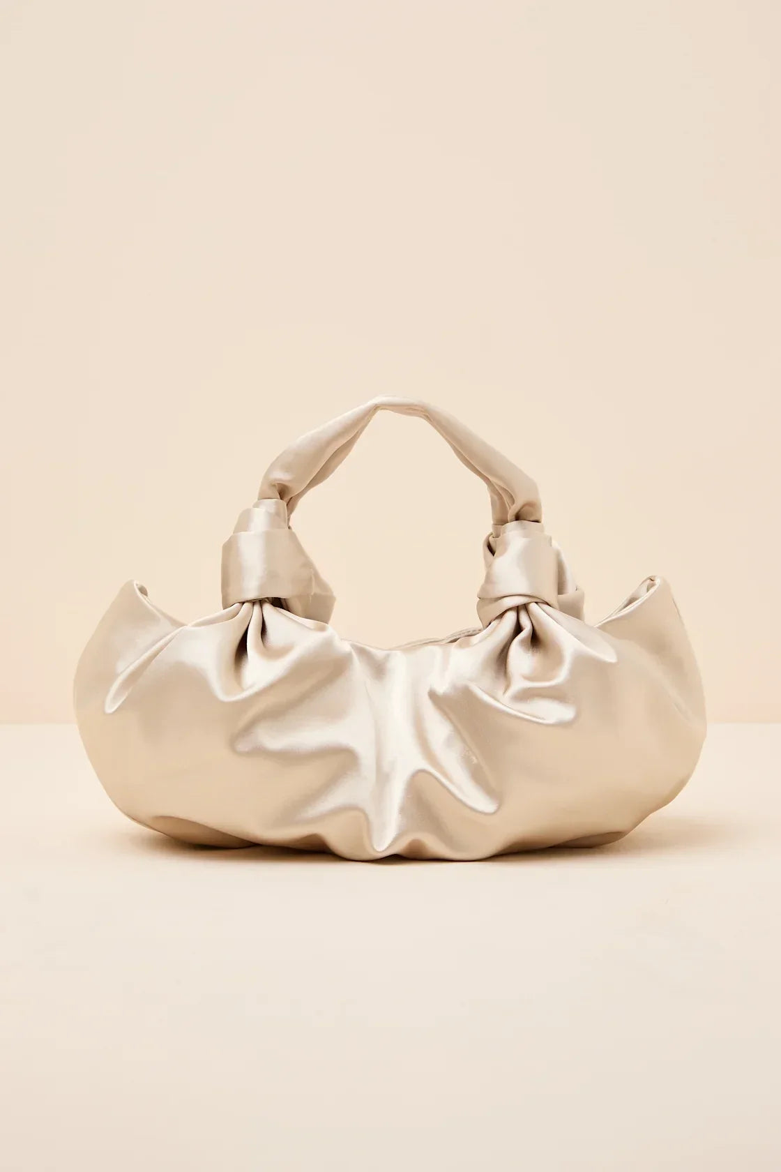 Maelynn Champagne Satin Knotted Handle Bag